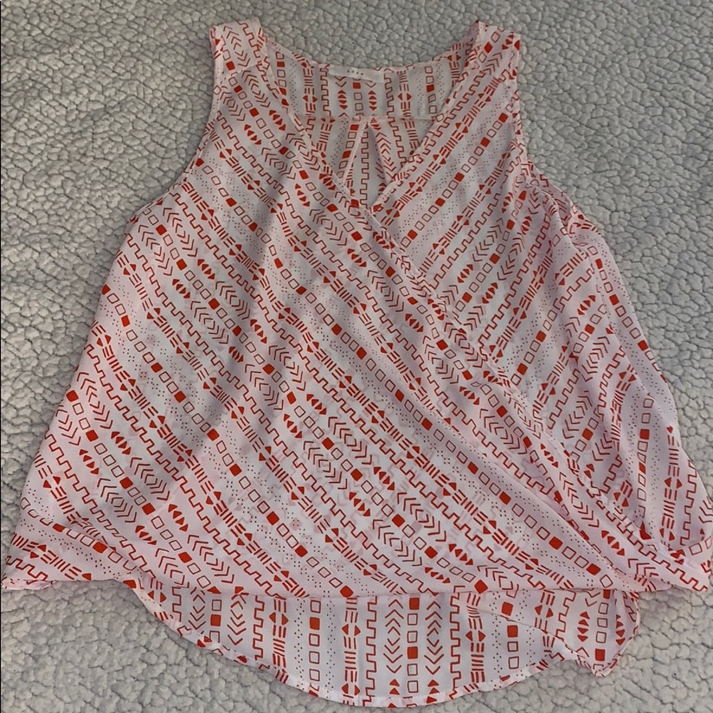 Lush orange and black sleeveless top
